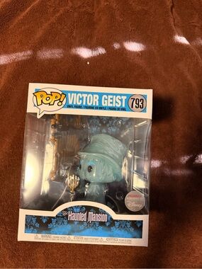 Funko Victor Geist Ghost Figure in Light Blue with Gold Accent
